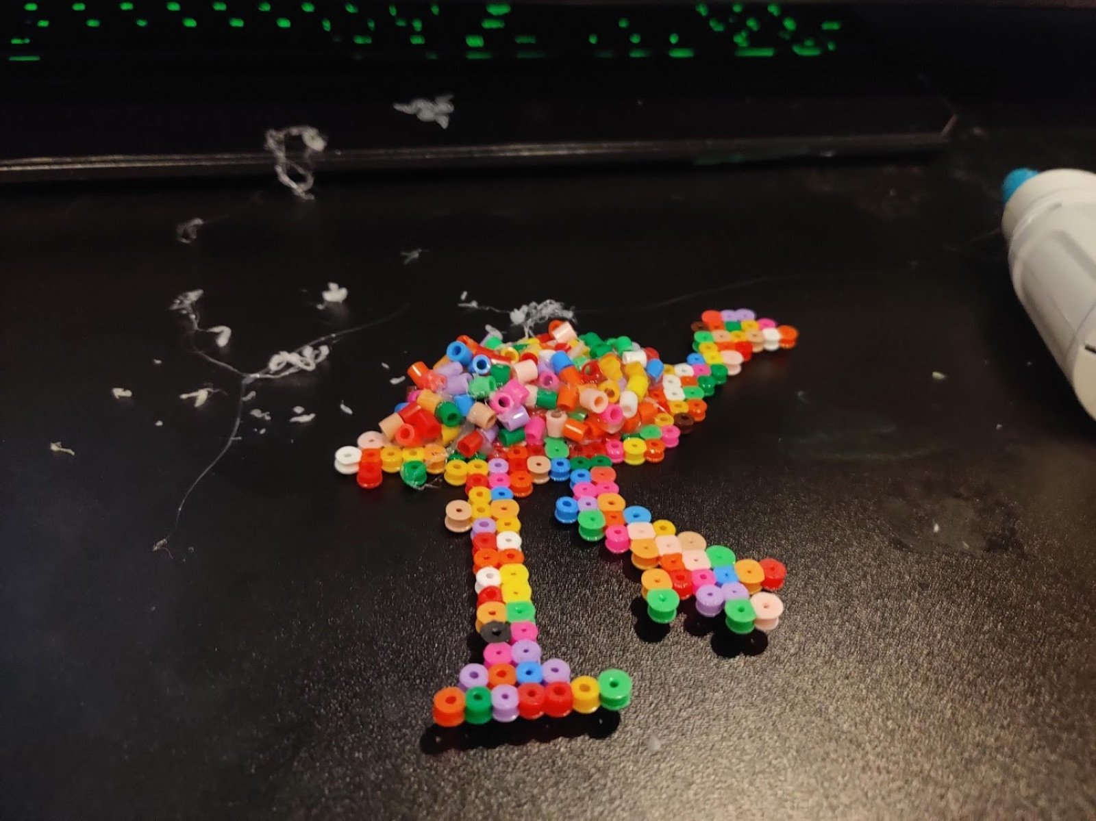 The emu partly assembled from Perler beads