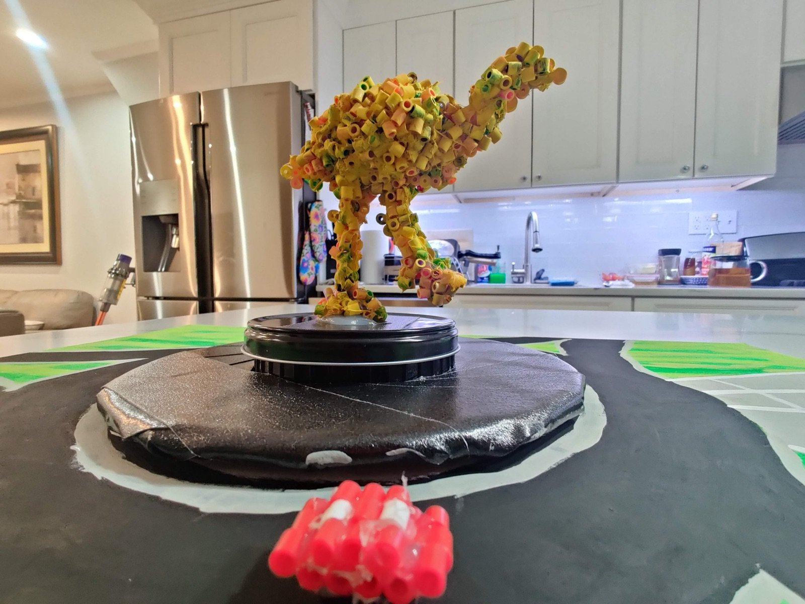 Close-up of the Perler bead emu on its base